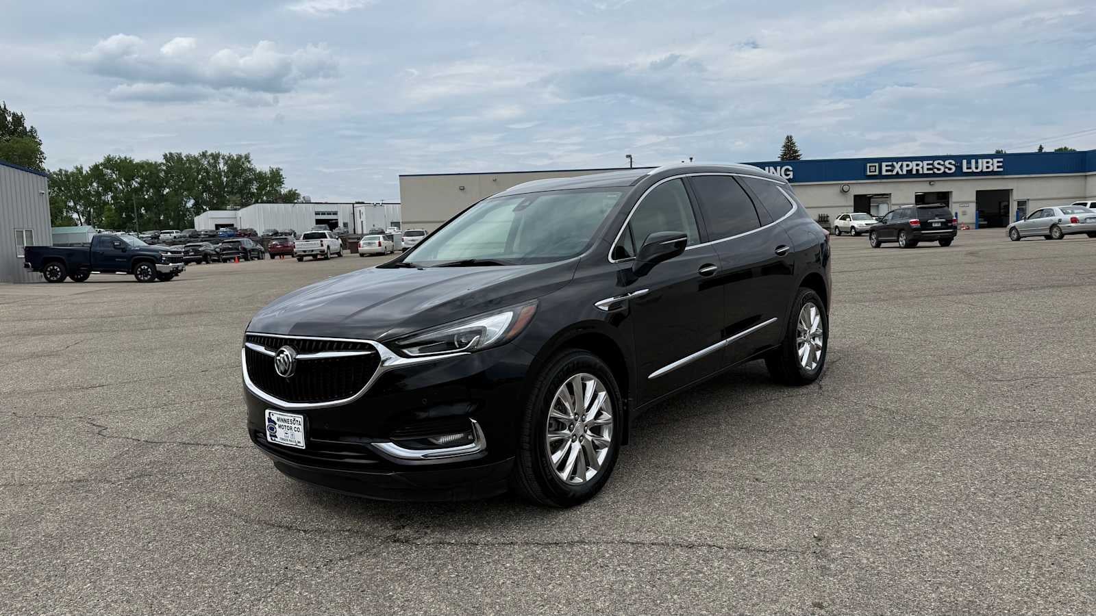 2021 Buick Enclave Premium in Ebony Twilight Metallic — front three-quarter view